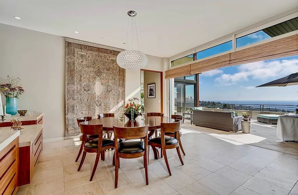 The Home in La Jolla is a classic contemporary estate has sweeping panoramic views of both the ocean and La Jolla Country Club Golf Course now available for sale. This house located at 6848 Country Club Dr, La Jolla, California