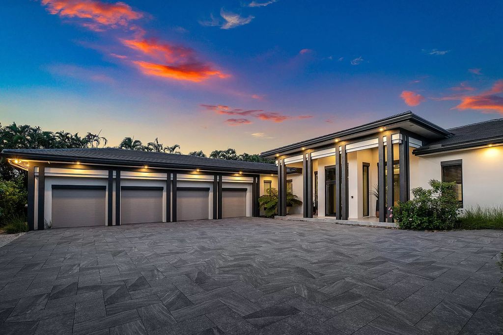 The Home in Delray Beach is a striking custom-built estate with the grand open concept, luxury finishes and modern architectural millwork now available for sale. This home located at 5526 Vintage Oaks Ter, Delray Beach, Florida