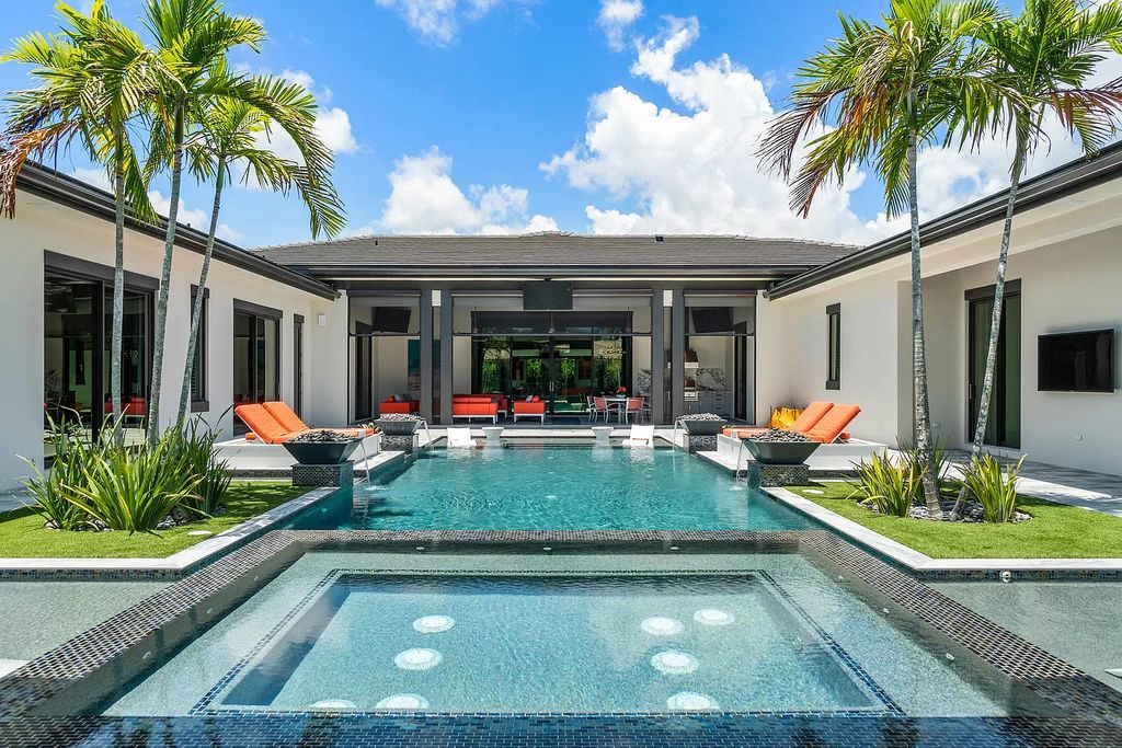 The Home in Delray Beach is a striking custom-built estate with the grand open concept, luxury finishes and modern architectural millwork now available for sale. This home located at 5526 Vintage Oaks Ter, Delray Beach, Florida