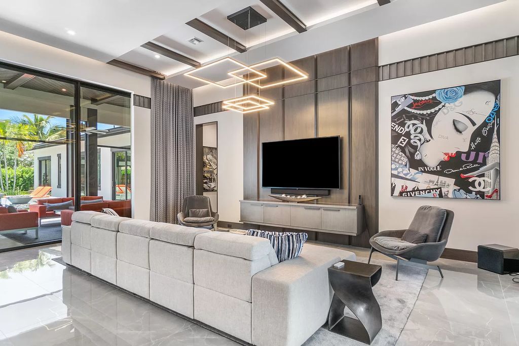 The Home in Delray Beach is a striking custom-built estate with the grand open concept, luxury finishes and modern architectural millwork now available for sale. This home located at 5526 Vintage Oaks Ter, Delray Beach, Florida