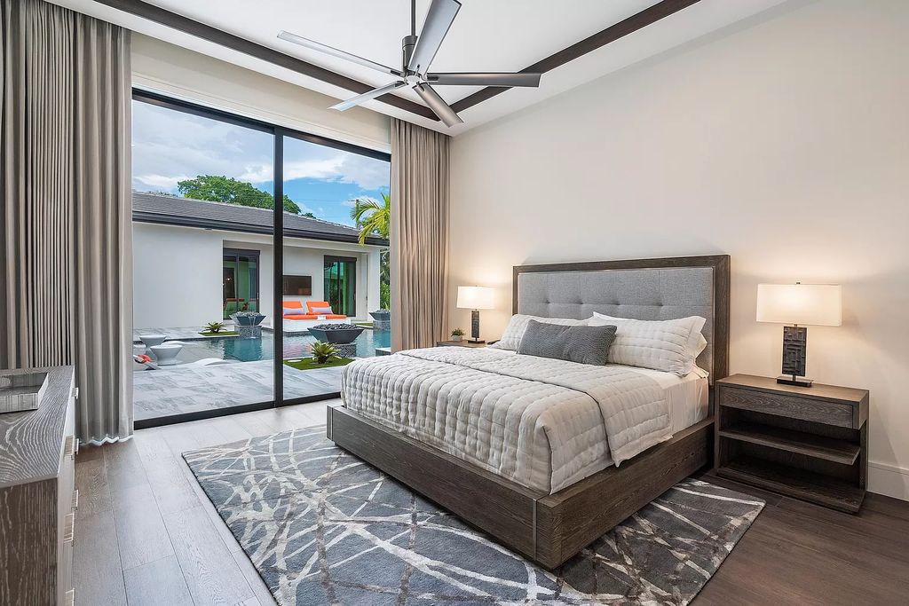 The Home in Delray Beach is a striking custom-built estate with the grand open concept, luxury finishes and modern architectural millwork now available for sale. This home located at 5526 Vintage Oaks Ter, Delray Beach, Florida