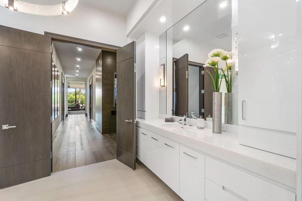 The Home in Delray Beach is a striking custom-built estate with the grand open concept, luxury finishes and modern architectural millwork now available for sale. This home located at 5526 Vintage Oaks Ter, Delray Beach, Florida
