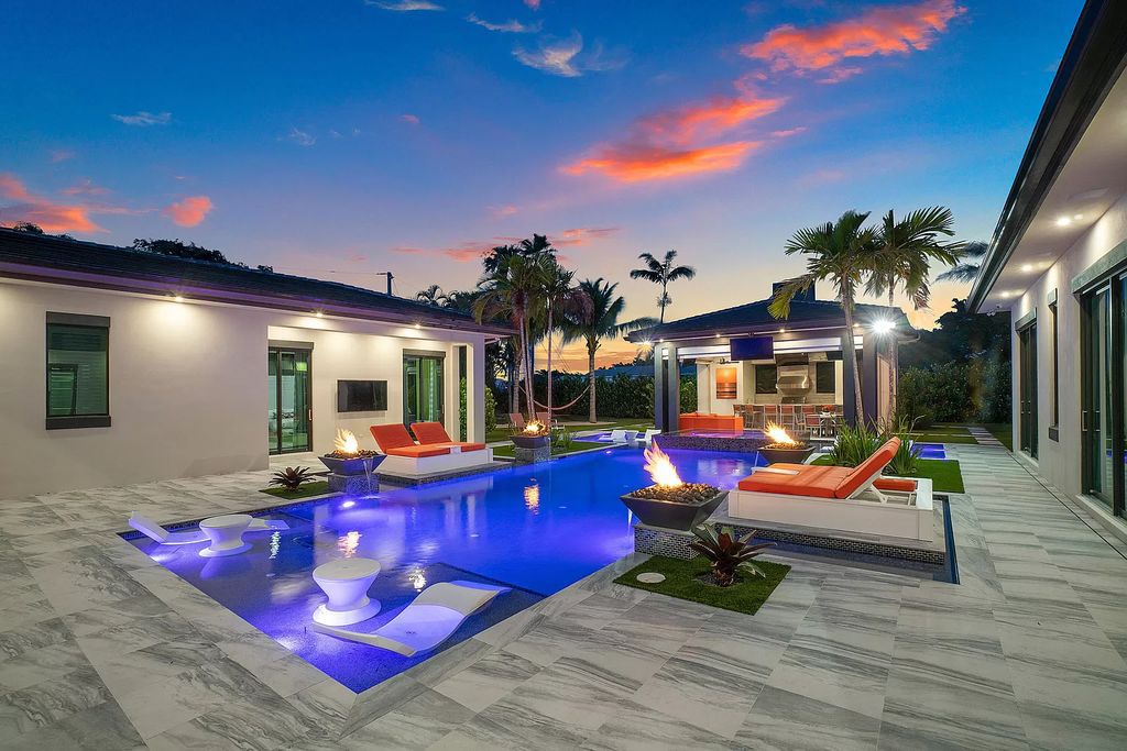 The Home in Delray Beach is a striking custom-built estate with the grand open concept, luxury finishes and modern architectural millwork now available for sale. This home located at 5526 Vintage Oaks Ter, Delray Beach, Florida