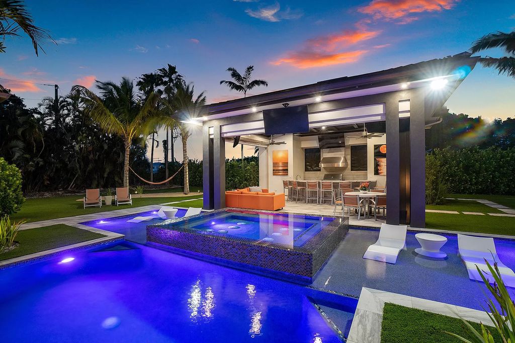 The Home in Delray Beach is a striking custom-built estate with the grand open concept, luxury finishes and modern architectural millwork now available for sale. This home located at 5526 Vintage Oaks Ter, Delray Beach, Florida