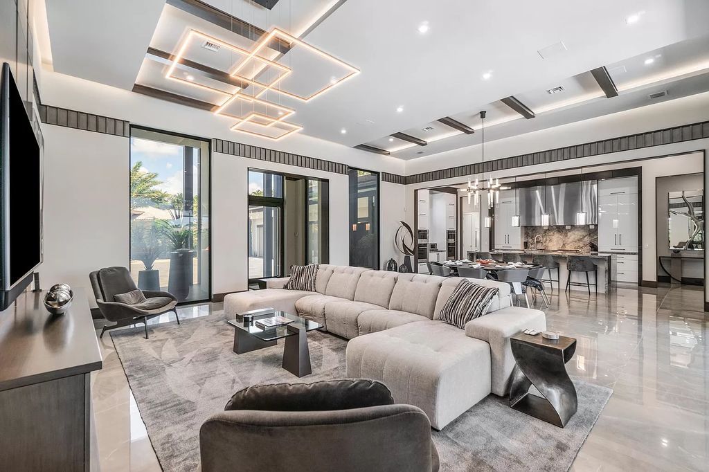 The Home in Delray Beach is a striking custom-built estate with the grand open concept, luxury finishes and modern architectural millwork now available for sale. This home located at 5526 Vintage Oaks Ter, Delray Beach, Florida