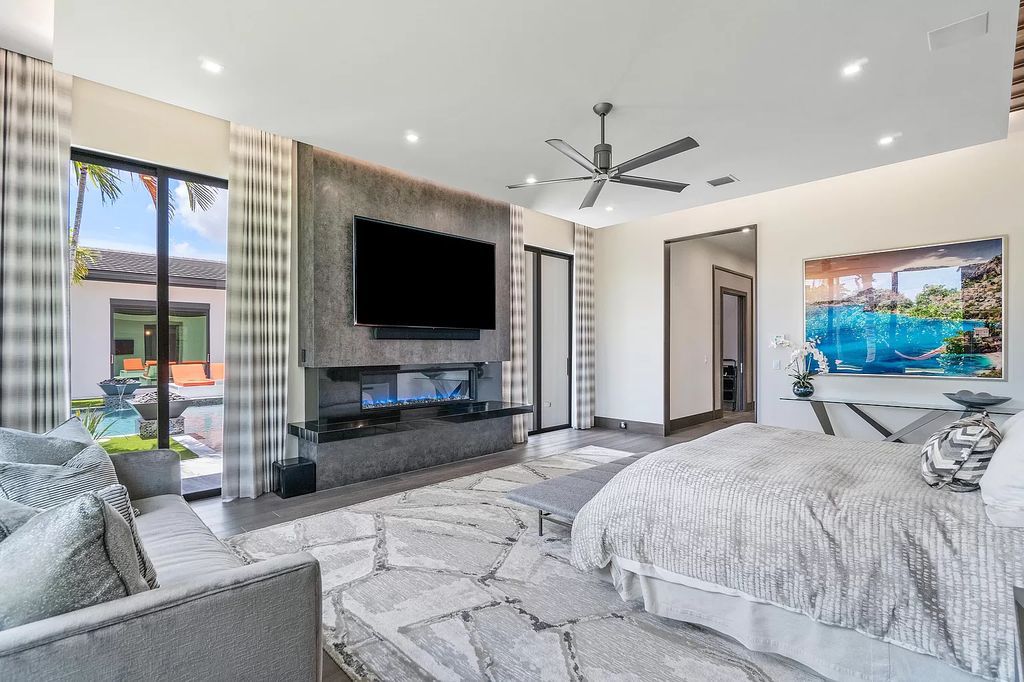 The Home in Delray Beach is a striking custom-built estate with the grand open concept, luxury finishes and modern architectural millwork now available for sale. This home located at 5526 Vintage Oaks Ter, Delray Beach, Florida