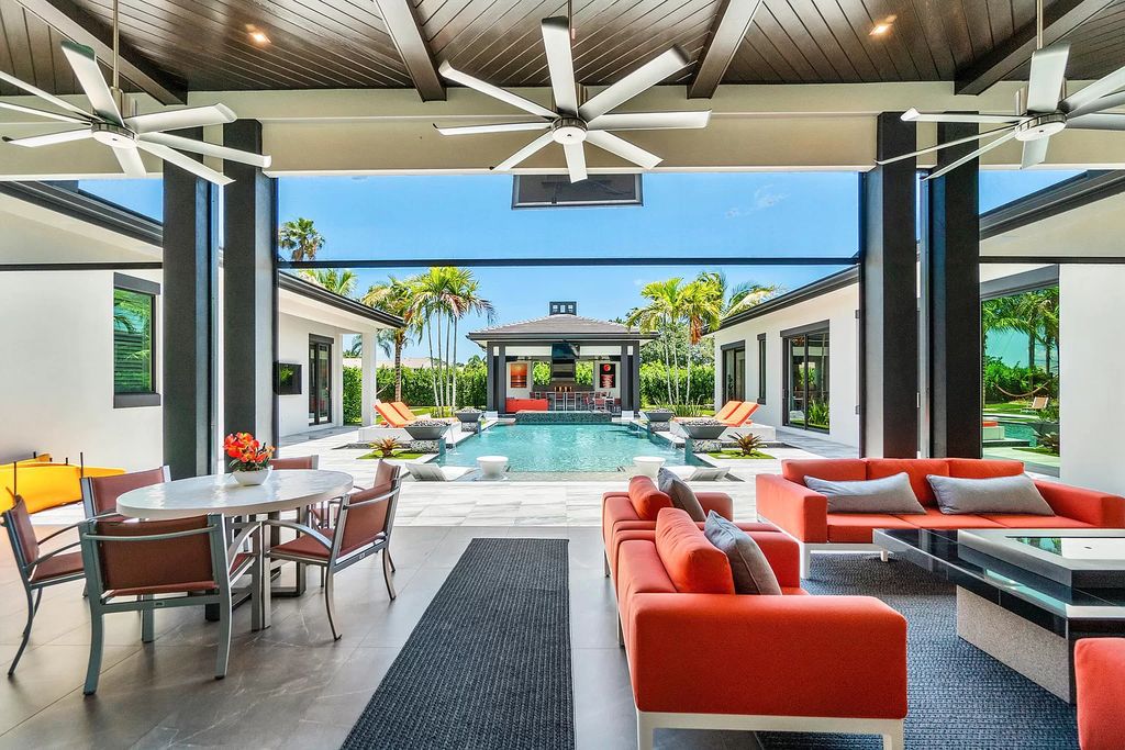 The Home in Delray Beach is a striking custom-built estate with the grand open concept, luxury finishes and modern architectural millwork now available for sale. This home located at 5526 Vintage Oaks Ter, Delray Beach, Florida