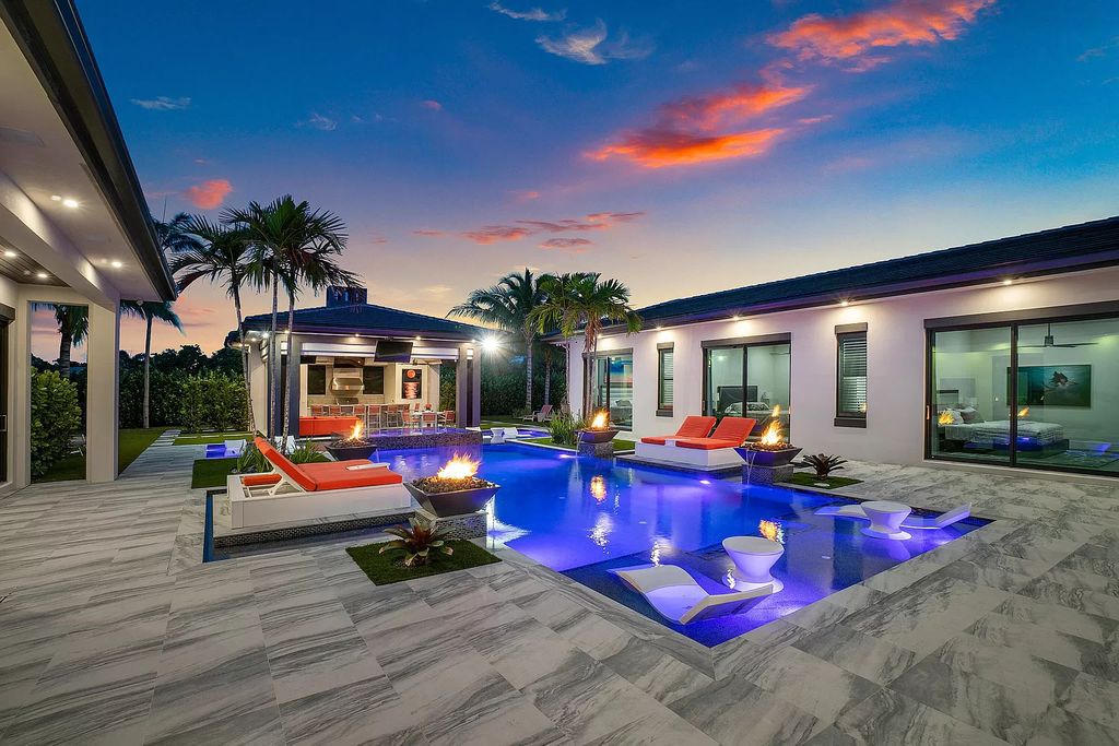 The Home in Delray Beach is a striking custom-built estate with the grand open concept, luxury finishes and modern architectural millwork now available for sale. This home located at 5526 Vintage Oaks Ter, Delray Beach, Florida