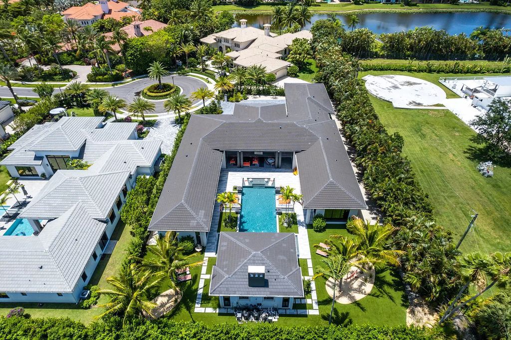 The Home in Delray Beach is a striking custom-built estate with the grand open concept, luxury finishes and modern architectural millwork now available for sale. This home located at 5526 Vintage Oaks Ter, Delray Beach, Florida