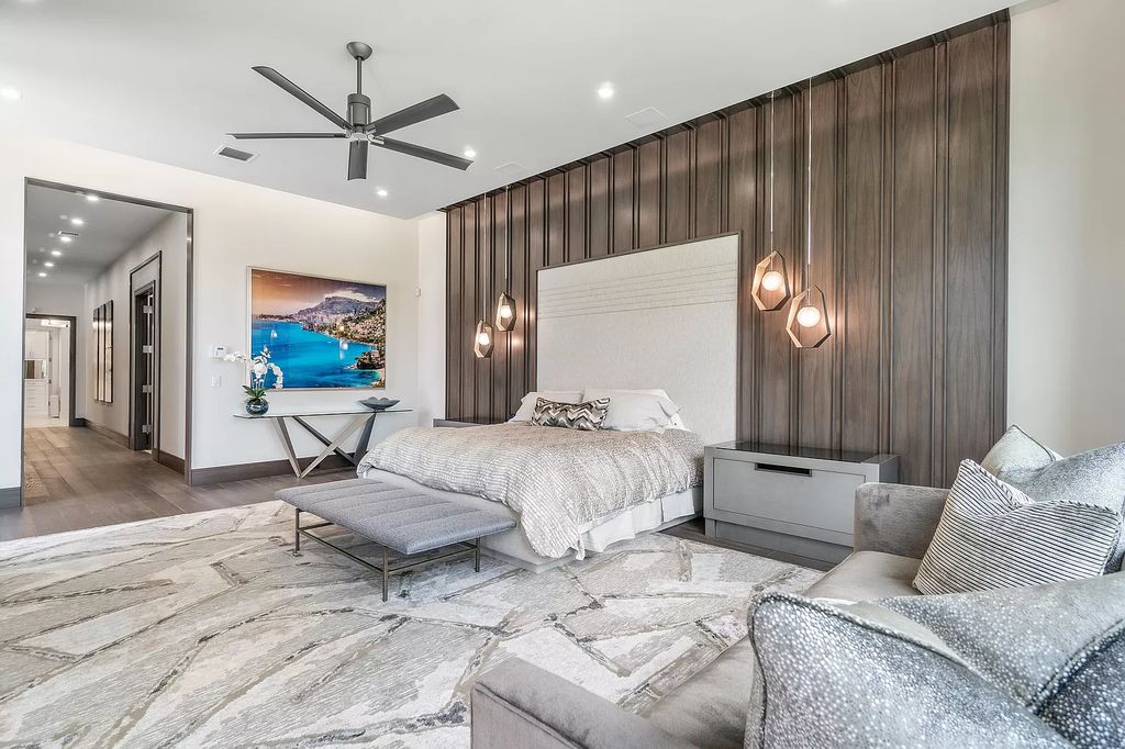 The Home in Delray Beach is a striking custom-built estate with the grand open concept, luxury finishes and modern architectural millwork now available for sale. This home located at 5526 Vintage Oaks Ter, Delray Beach, Florida