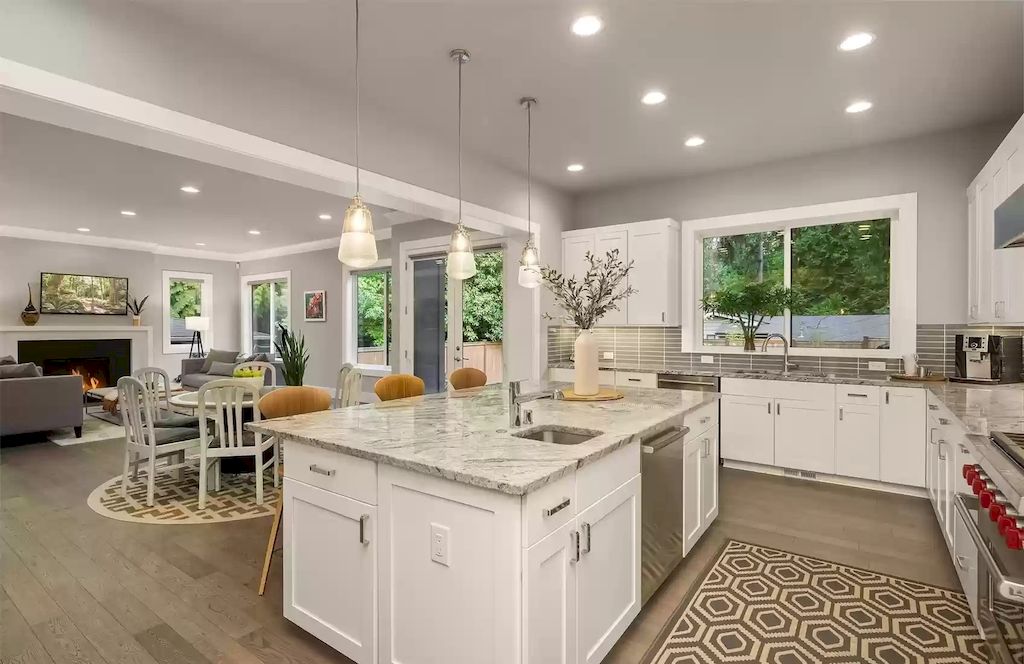 The House in Bellevue is covered outdoor living perfect for year-round enjoyment, now available for sale. This home located at 10803 SE 25th Place, Bellevue, Washington