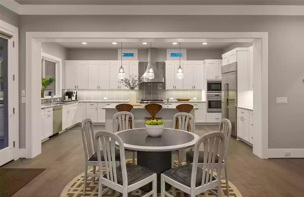 The House in Bellevue is covered outdoor living perfect for year-round enjoyment, now available for sale. This home located at 10803 SE 25th Place, Bellevue, Washington