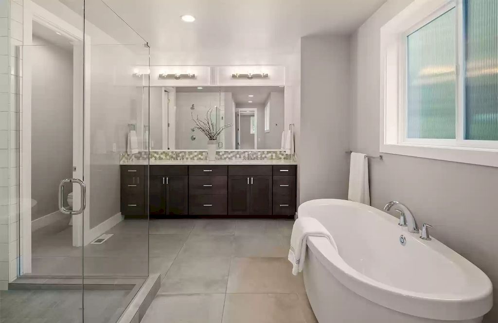 The House in Bellevue is covered outdoor living perfect for year-round enjoyment, now available for sale. This home located at 10803 SE 25th Place, Bellevue, Washington