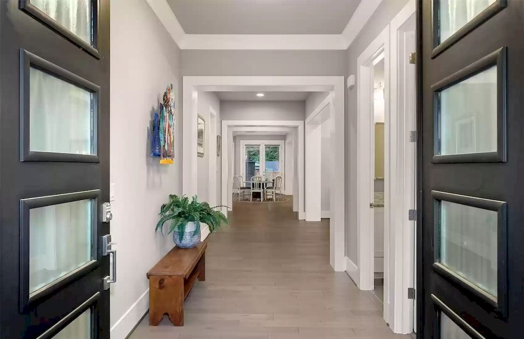 The House in Bellevue is covered outdoor living perfect for year-round enjoyment, now available for sale. This home located at 10803 SE 25th Place, Bellevue, Washington