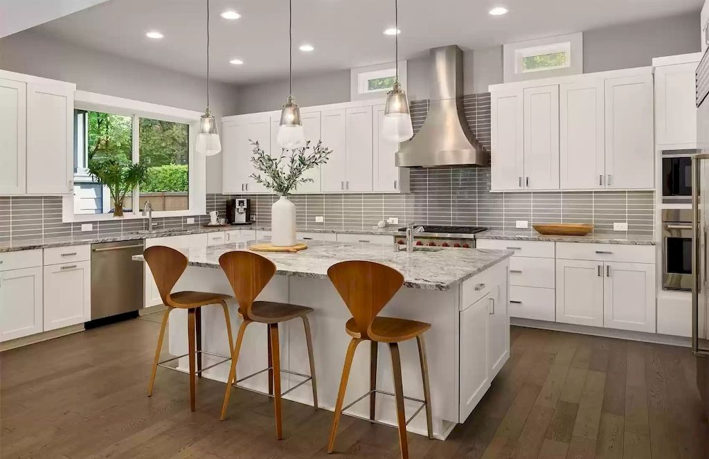 The House in Bellevue is covered outdoor living perfect for year-round enjoyment, now available for sale. This home located at 10803 SE 25th Place, Bellevue, Washington