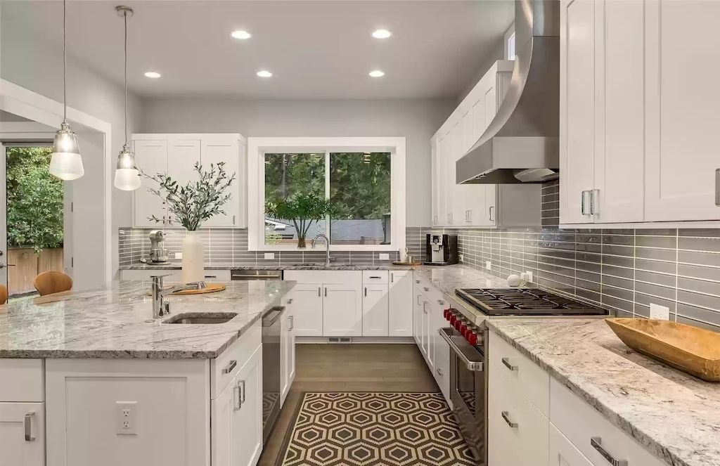 The House in Bellevue is covered outdoor living perfect for year-round enjoyment, now available for sale. This home located at 10803 SE 25th Place, Bellevue, Washington