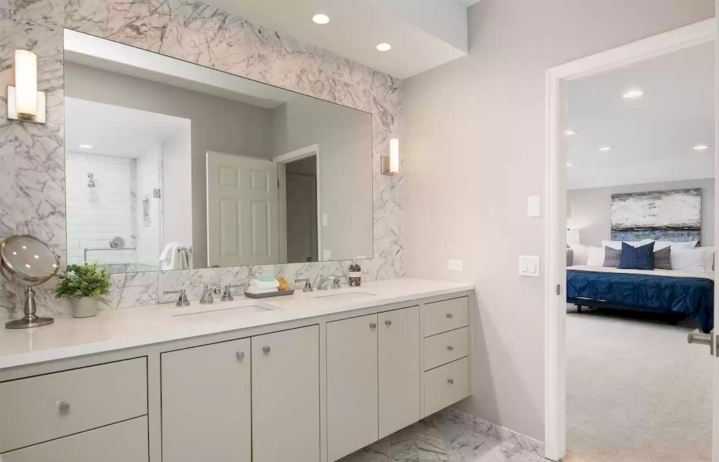 The Estate in Washington is a luxurious home filled with natural light in an idyllic verdant setting now available for sale. This home located at 8521 Hunts Point Lane, Hunts Point, Washington; offering 05 bedrooms and 04 bathrooms with 3,549 square feet of living spaces.