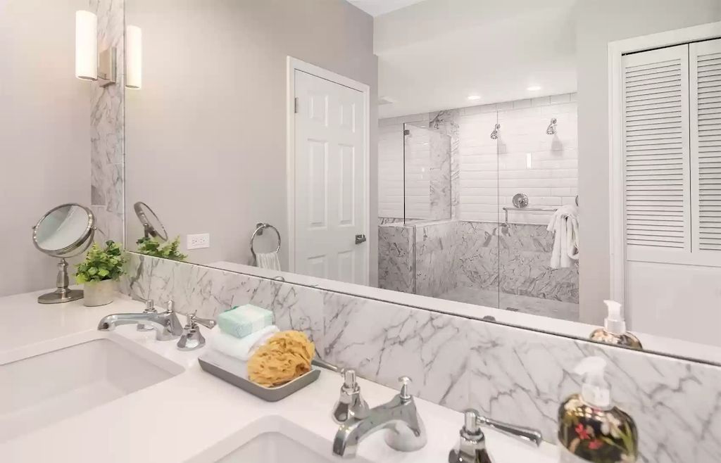 The Estate in Washington is a luxurious home filled with natural light in an idyllic verdant setting now available for sale. This home located at 8521 Hunts Point Lane, Hunts Point, Washington; offering 05 bedrooms and 04 bathrooms with 3,549 square feet of living spaces.