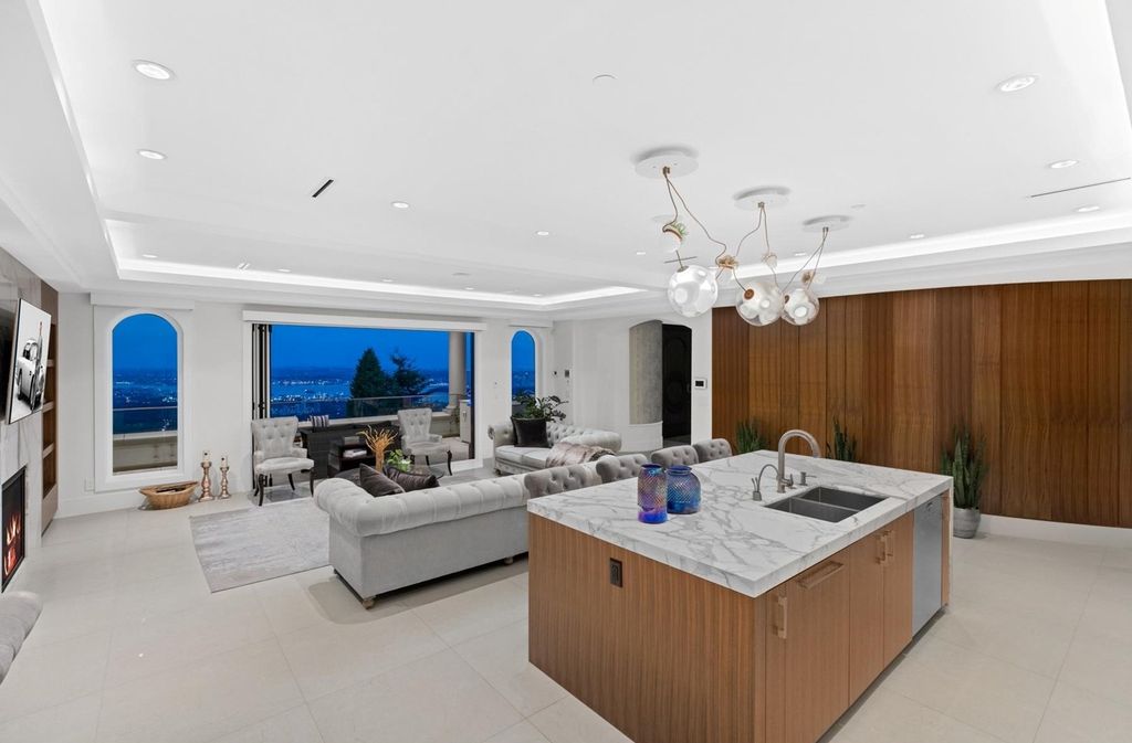 The Home in West Vancouver offers the panoramic view of the Great Vancouver and the majestic Lions Gate bridge, now available for sale. This home located at 1522 Chartwell Dr, West Vancouver, BC V7S 2S1, Canada