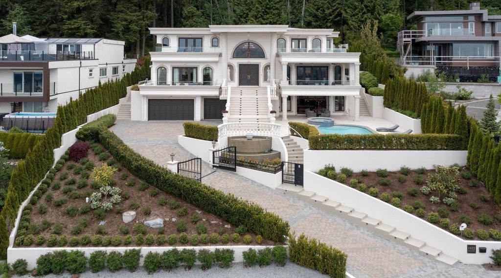 The Home in West Vancouver offers the panoramic view of the Great Vancouver and the majestic Lions Gate bridge, now available for sale. This home located at 1522 Chartwell Dr, West Vancouver, BC V7S 2S1, Canada