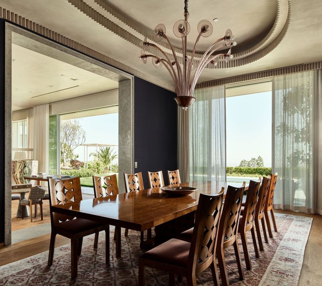 The Mansion in Los Angeles is a contemporary masterpiece with impressive views, inspired design, and a serenely secluded location with gated access now available for sale. This home located at 335 Trousdale Pl, Beverly Hills, California