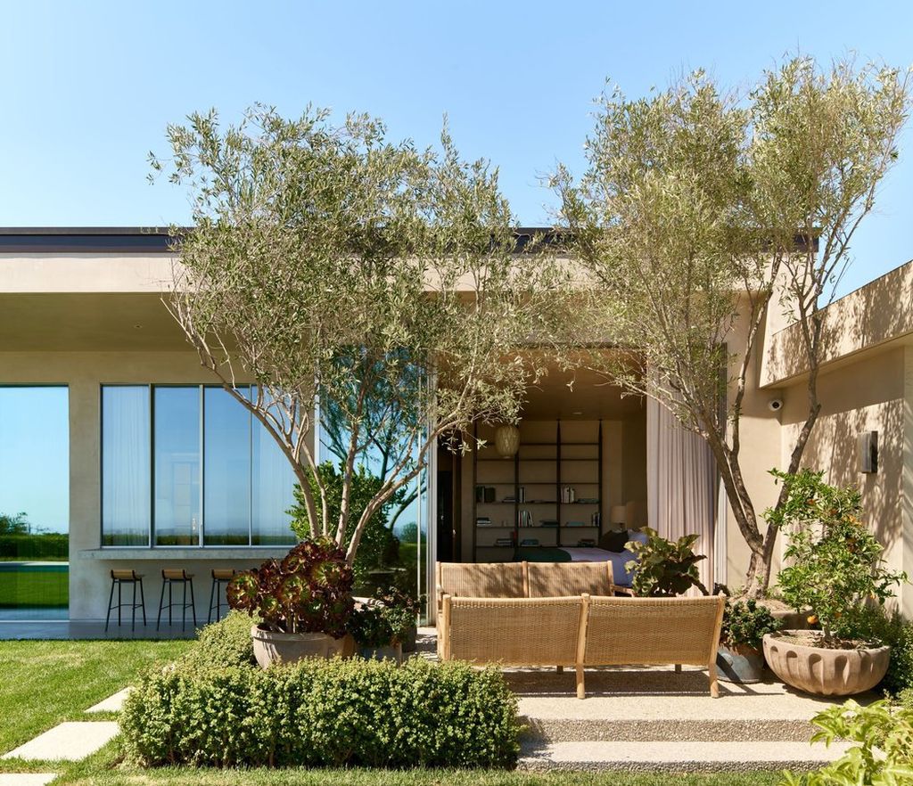 The Mansion in Los Angeles is a contemporary masterpiece with impressive views, inspired design, and a serenely secluded location with gated access now available for sale. This home located at 335 Trousdale Pl, Beverly Hills, California
