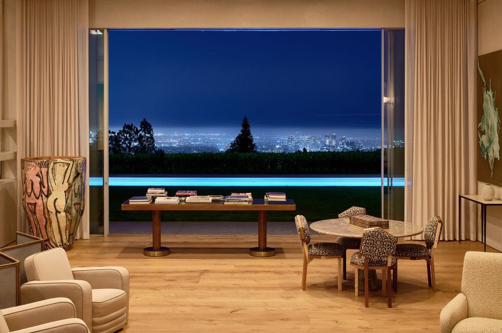 The Mansion in Los Angeles is a contemporary masterpiece with impressive views, inspired design, and a serenely secluded location with gated access now available for sale. This home located at 335 Trousdale Pl, Beverly Hills, California