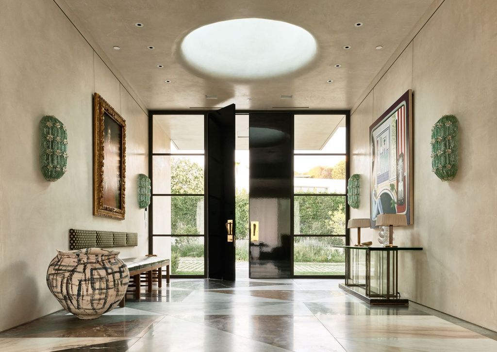 The Mansion in Los Angeles is a contemporary masterpiece with impressive views, inspired design, and a serenely secluded location with gated access now available for sale. This home located at 335 Trousdale Pl, Beverly Hills, California