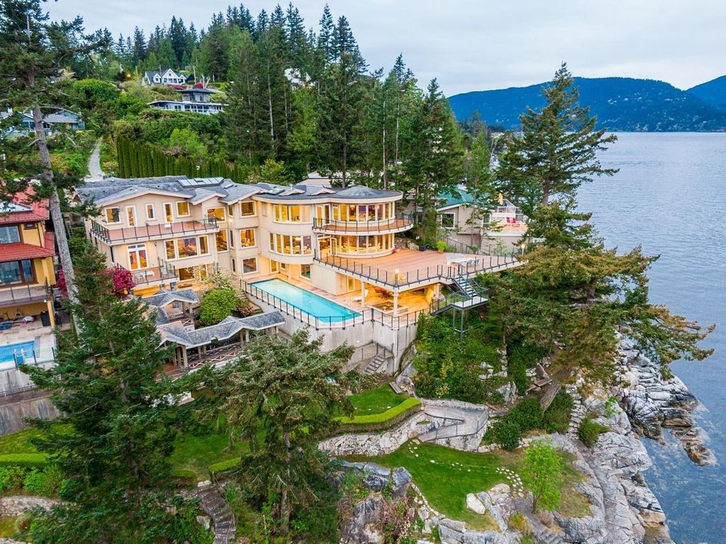 The Estate in West Vancouver is a luxurious home with stunning ocean views, now available for sale. This home located at 6935 Isleview Rd, West Vancouver, BC V7W 2L1, Canada