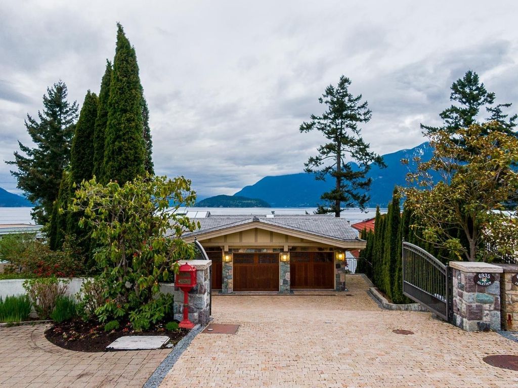 The Estate in West Vancouver is a luxurious home with stunning ocean views, now available for sale. This home located at 6935 Isleview Rd, West Vancouver, BC V7W 2L1, Canada