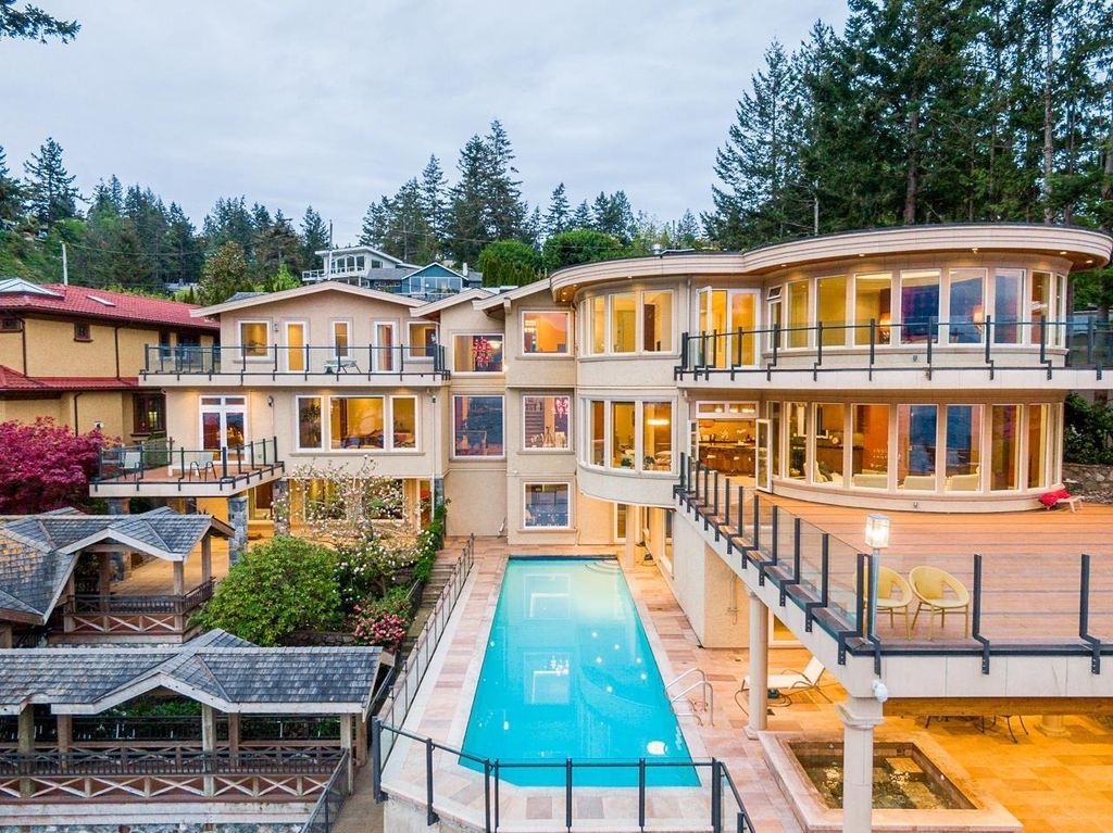 The Estate in West Vancouver is a luxurious home with stunning ocean views, now available for sale. This home located at 6935 Isleview Rd, West Vancouver, BC V7W 2L1, Canada