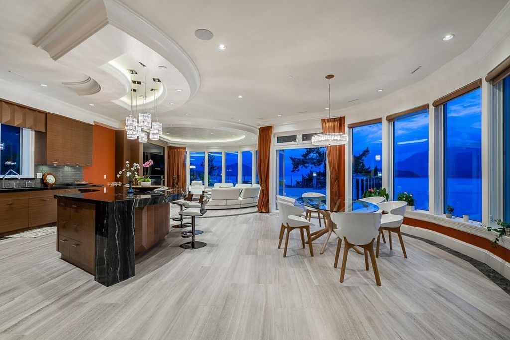 The Estate in West Vancouver is a luxurious home with stunning ocean views, now available for sale. This home located at 6935 Isleview Rd, West Vancouver, BC V7W 2L1, Canada