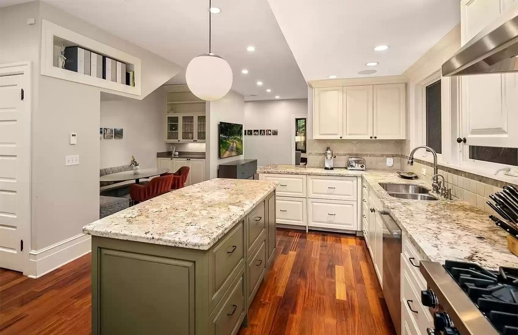 The Estate in Washington is a luxurious home surrounded by lush greenery and majestic trees now available for sale. This home located at 3816 E Garfield Street, Seattle, Washington; offering 06 bedrooms and 05 bathrooms with 5,328 square feet of living spaces.