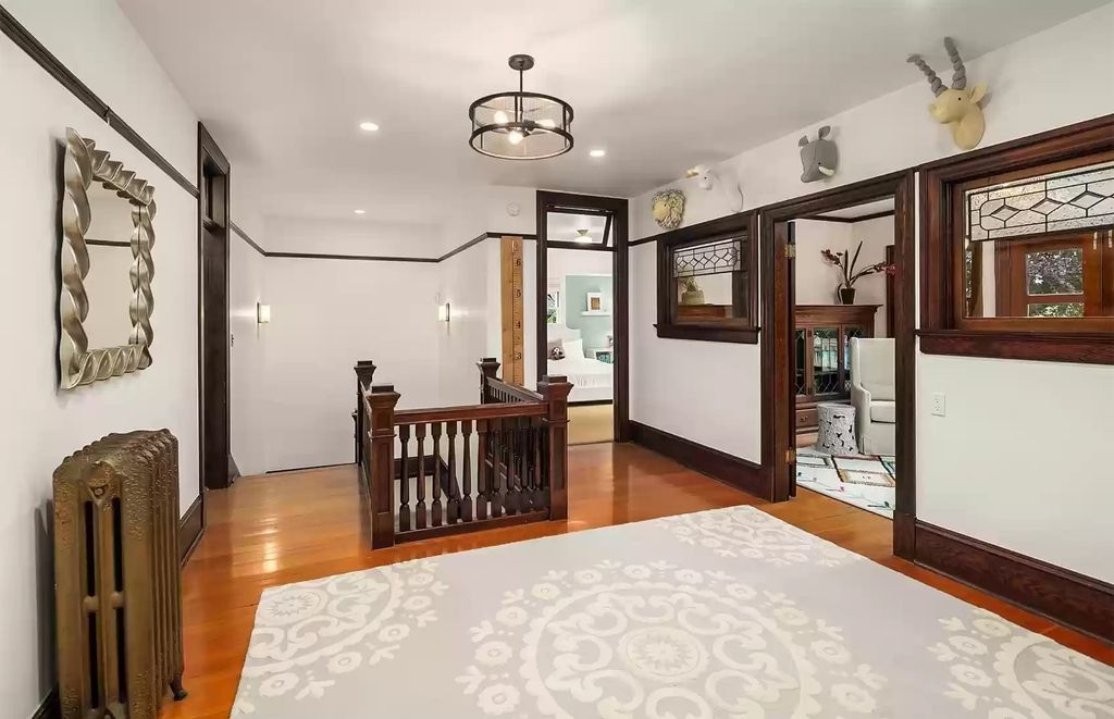 The Estate in Washington is a luxurious home surrounded by lush greenery and majestic trees now available for sale. This home located at 3816 E Garfield Street, Seattle, Washington; offering 06 bedrooms and 05 bathrooms with 5,328 square feet of living spaces.