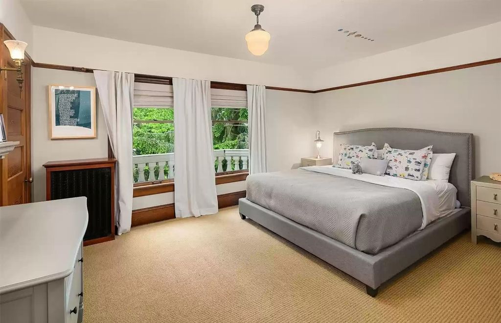 The Estate in Washington is a luxurious home surrounded by lush greenery and majestic trees now available for sale. This home located at 3816 E Garfield Street, Seattle, Washington; offering 06 bedrooms and 05 bathrooms with 5,328 square feet of living spaces.