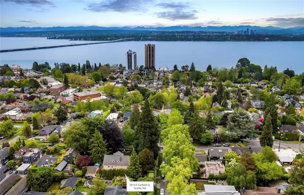 The Estate in Washington is a luxurious home surrounded by lush greenery and majestic trees now available for sale. This home located at 3816 E Garfield Street, Seattle, Washington; offering 06 bedrooms and 05 bathrooms with 5,328 square feet of living spaces.