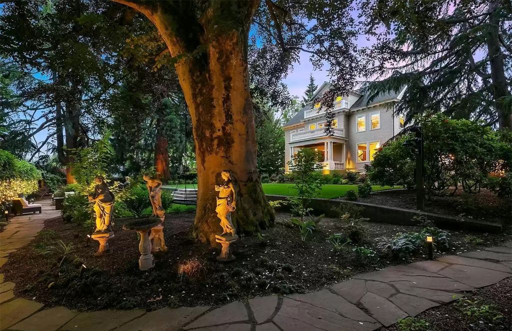 The Estate in Washington is a luxurious home surrounded by lush greenery and majestic trees now available for sale. This home located at 3816 E Garfield Street, Seattle, Washington; offering 06 bedrooms and 05 bathrooms with 5,328 square feet of living spaces.