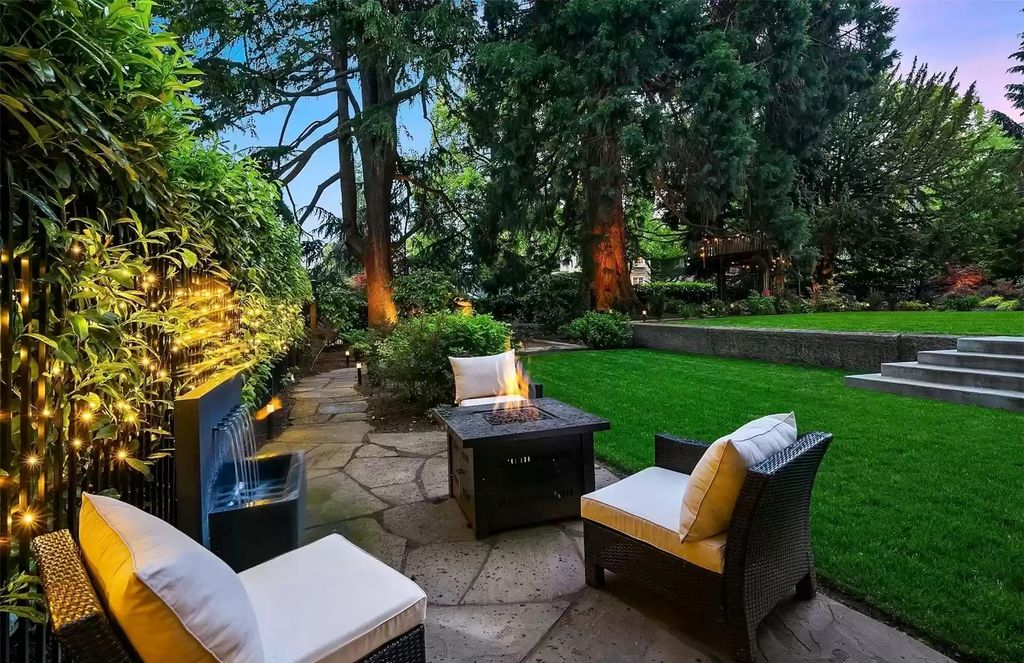 The Estate in Washington is a luxurious home surrounded by lush greenery and majestic trees now available for sale. This home located at 3816 E Garfield Street, Seattle, Washington; offering 06 bedrooms and 05 bathrooms with 5,328 square feet of living spaces.