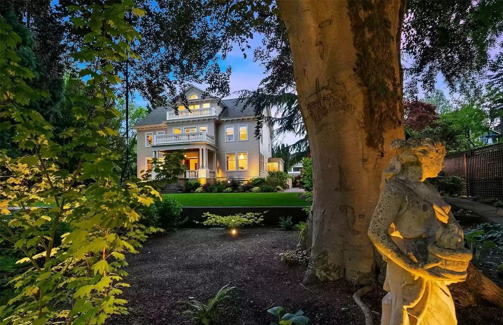 The Estate in Washington is a luxurious home surrounded by lush greenery and majestic trees now available for sale. This home located at 3816 E Garfield Street, Seattle, Washington; offering 06 bedrooms and 05 bathrooms with 5,328 square feet of living spaces.