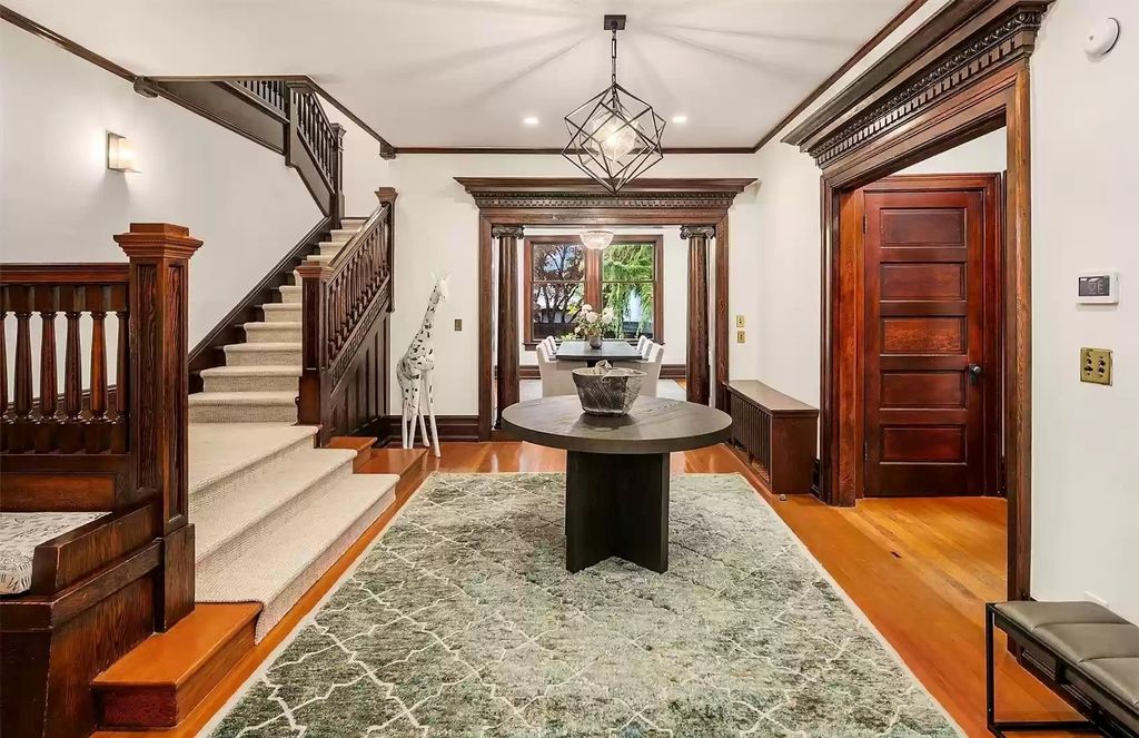 The Estate in Washington is a luxurious home surrounded by lush greenery and majestic trees now available for sale. This home located at 3816 E Garfield Street, Seattle, Washington; offering 06 bedrooms and 05 bathrooms with 5,328 square feet of living spaces.