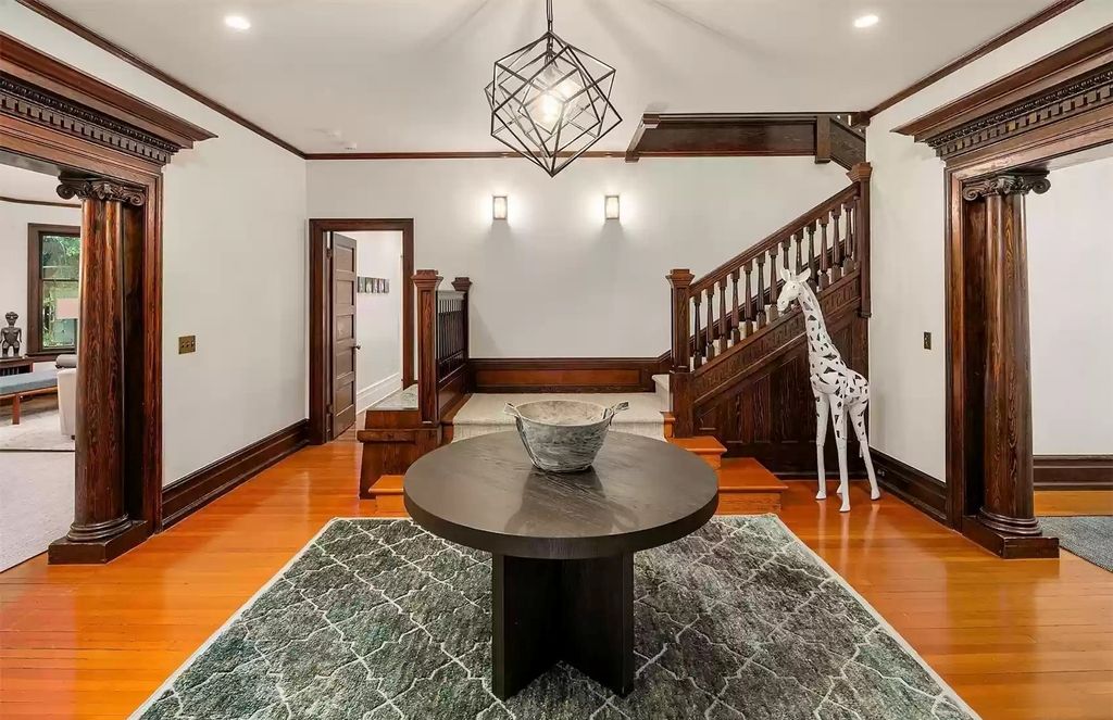 The Estate in Washington is a luxurious home surrounded by lush greenery and majestic trees now available for sale. This home located at 3816 E Garfield Street, Seattle, Washington; offering 06 bedrooms and 05 bathrooms with 5,328 square feet of living spaces.