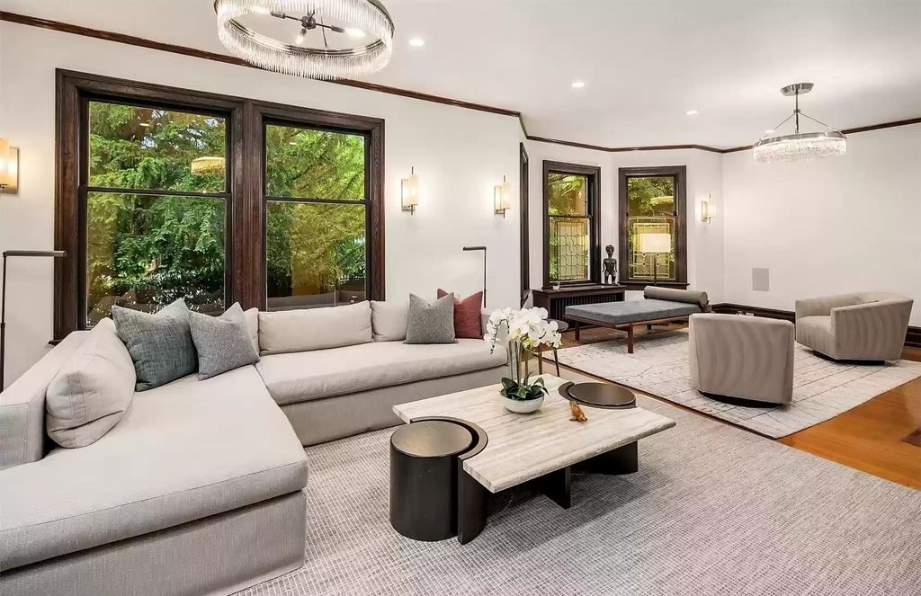 The Estate in Washington is a luxurious home surrounded by lush greenery and majestic trees now available for sale. This home located at 3816 E Garfield Street, Seattle, Washington; offering 06 bedrooms and 05 bathrooms with 5,328 square feet of living spaces.