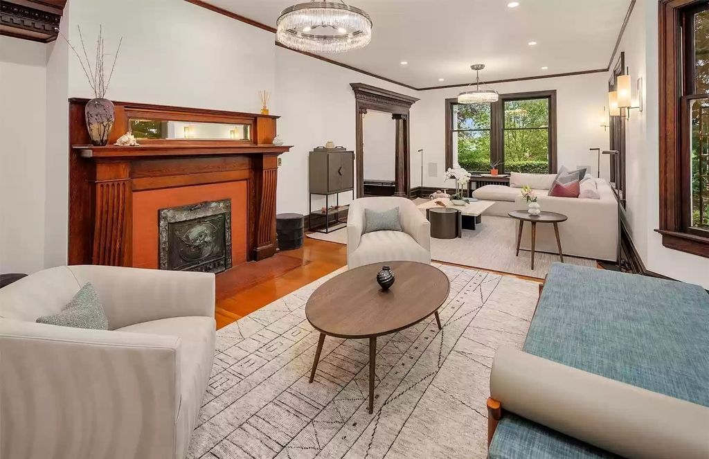 The Estate in Washington is a luxurious home surrounded by lush greenery and majestic trees now available for sale. This home located at 3816 E Garfield Street, Seattle, Washington; offering 06 bedrooms and 05 bathrooms with 5,328 square feet of living spaces.