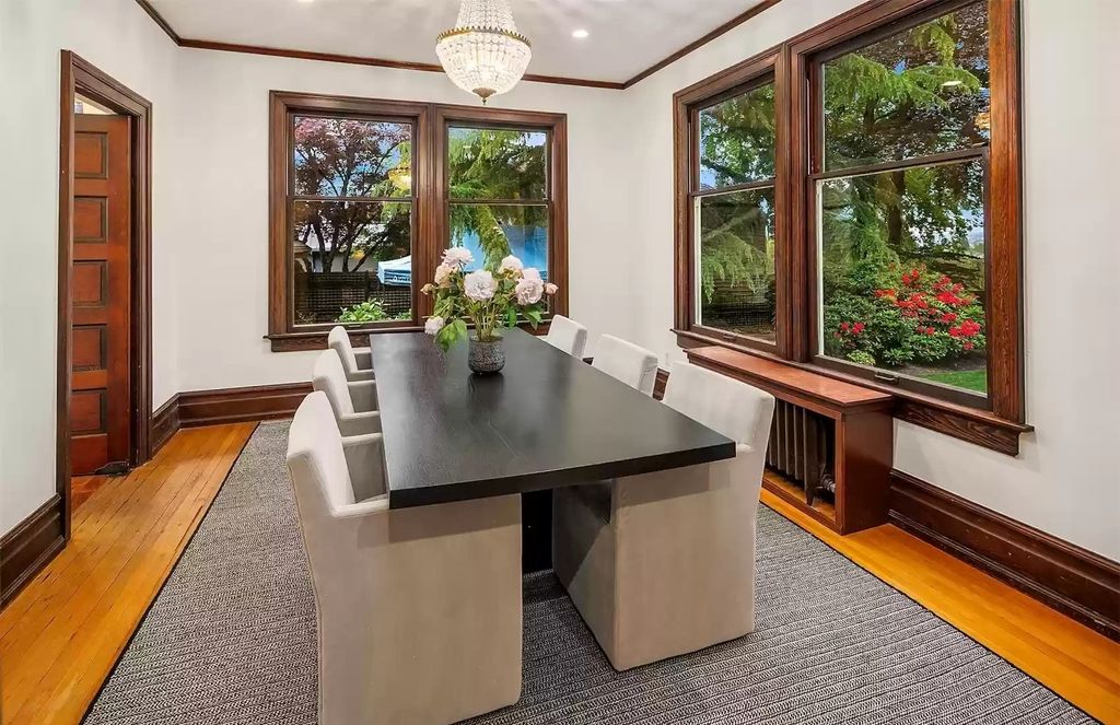The Estate in Washington is a luxurious home surrounded by lush greenery and majestic trees now available for sale. This home located at 3816 E Garfield Street, Seattle, Washington; offering 06 bedrooms and 05 bathrooms with 5,328 square feet of living spaces.