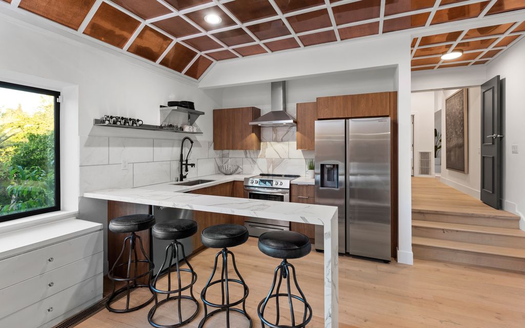 The Home in Los Angeles is a one-of-a-kind transitional estate on a beautiful tree lined street in the prestigious neighborhood of Little Holmby now available for sale. This home located at 10401 Wyton Dr, Los Angeles, California