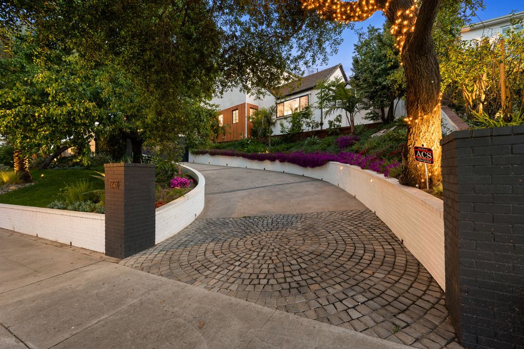 The Home in Los Angeles is a one-of-a-kind transitional estate on a beautiful tree lined street in the prestigious neighborhood of Little Holmby now available for sale. This home located at 10401 Wyton Dr, Los Angeles, California