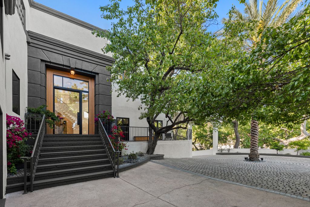 The Home in Los Angeles is a one-of-a-kind transitional estate on a beautiful tree lined street in the prestigious neighborhood of Little Holmby now available for sale. This home located at 10401 Wyton Dr, Los Angeles, California