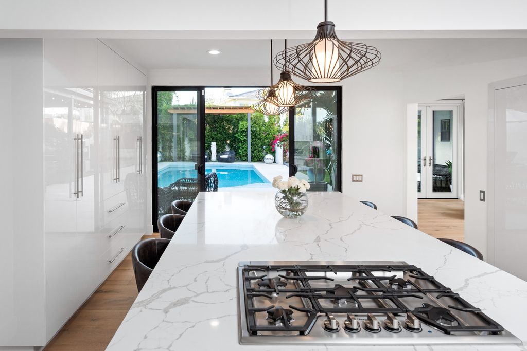 The Home in Los Angeles is a one-of-a-kind transitional estate on a beautiful tree lined street in the prestigious neighborhood of Little Holmby now available for sale. This home located at 10401 Wyton Dr, Los Angeles, California