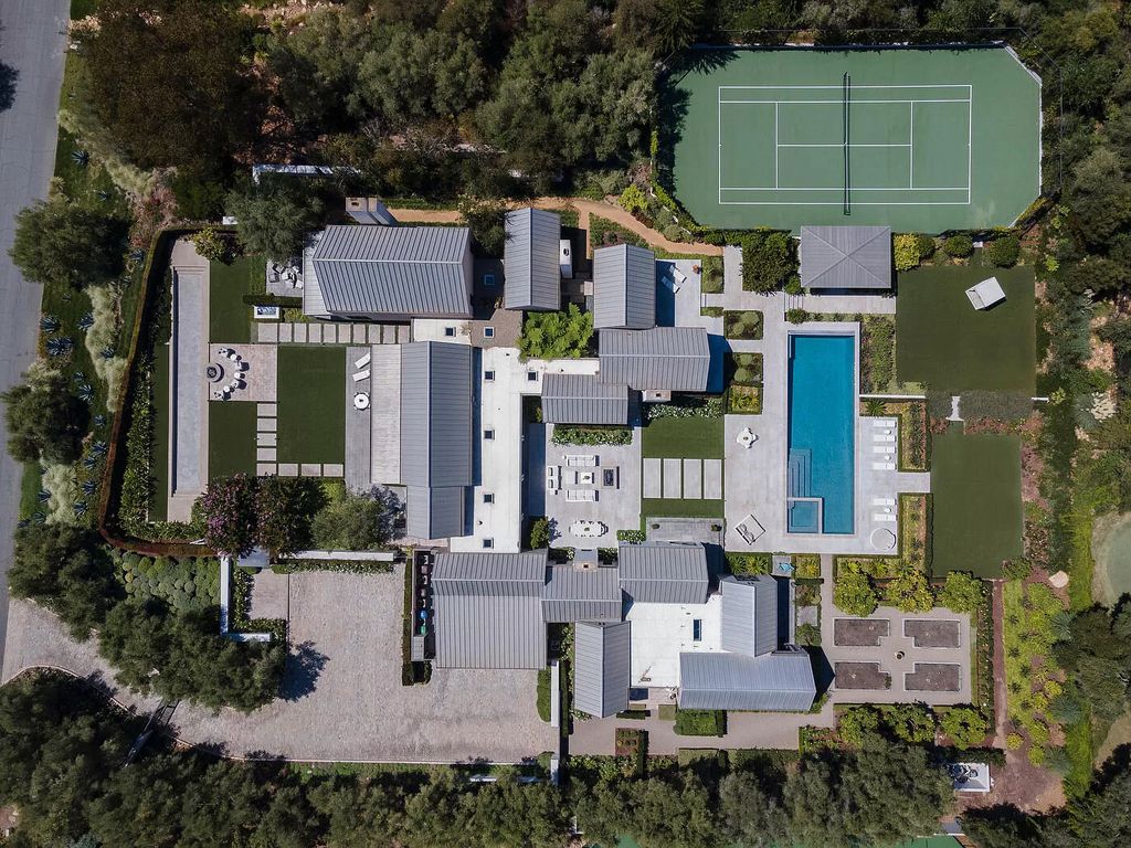 The Home in Santa Barbara is a stunning modern estate with newly constructed pool and spa, tennis court wit pavilion, vegetable gardens, firepit, stunning mountain, ocean and golf-course views now available for sale. This home located at 1850 Jelinda Dr, Santa Barbara, California