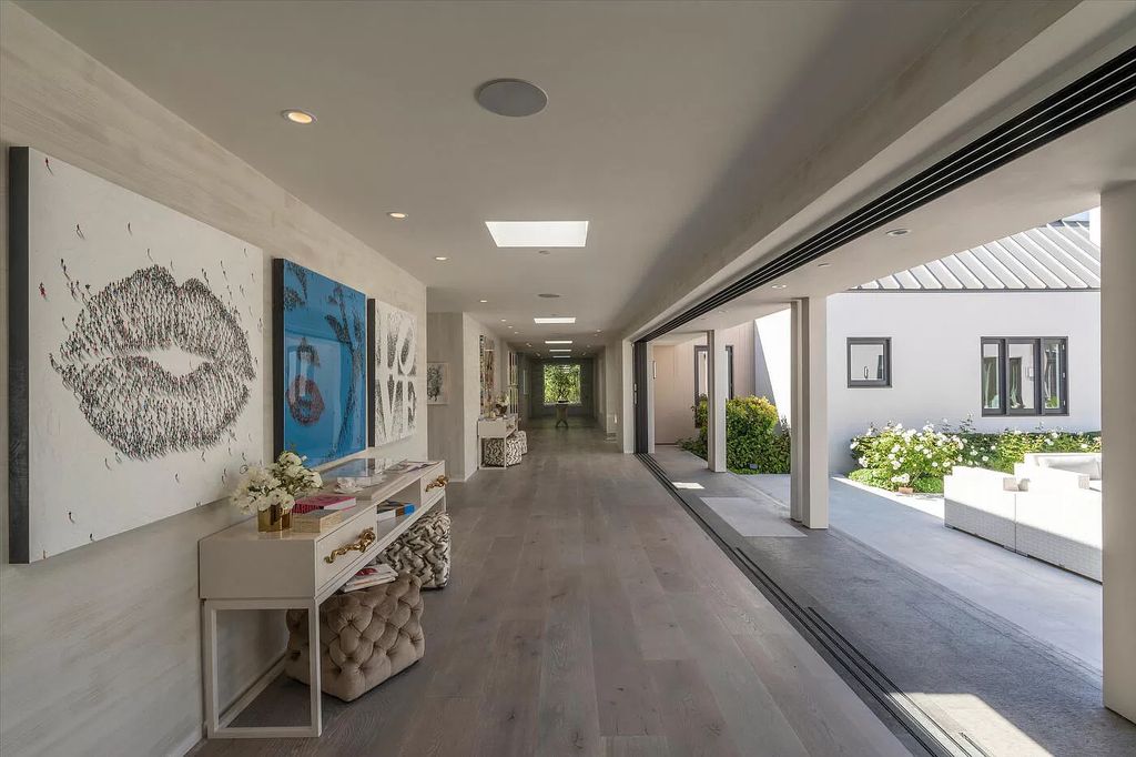 The Home in Santa Barbara is a stunning modern estate with newly constructed pool and spa, tennis court wit pavilion, vegetable gardens, firepit, stunning mountain, ocean and golf-course views now available for sale. This home located at 1850 Jelinda Dr, Santa Barbara, California